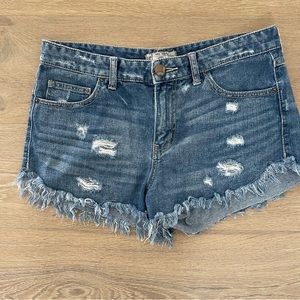Free People distressed cutoff denim shorts
